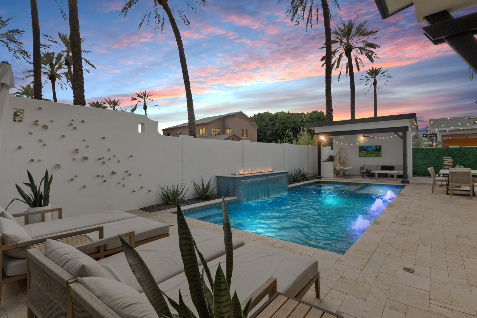 Palmera pool framed by date palms at twilight, Phoenix