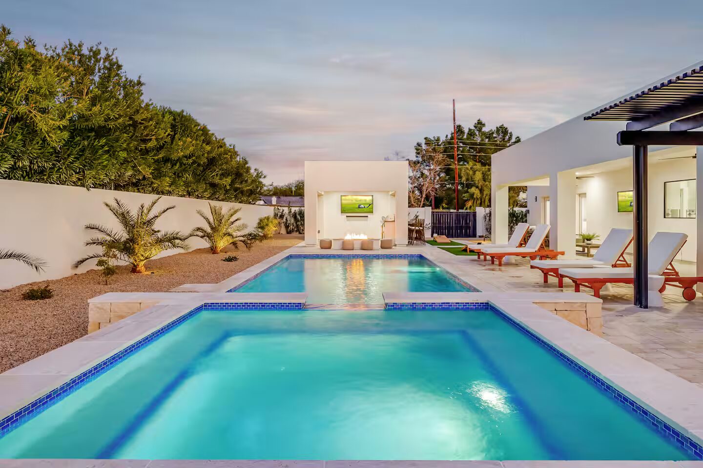 Querencia pool lit at twilight, Scottsdale