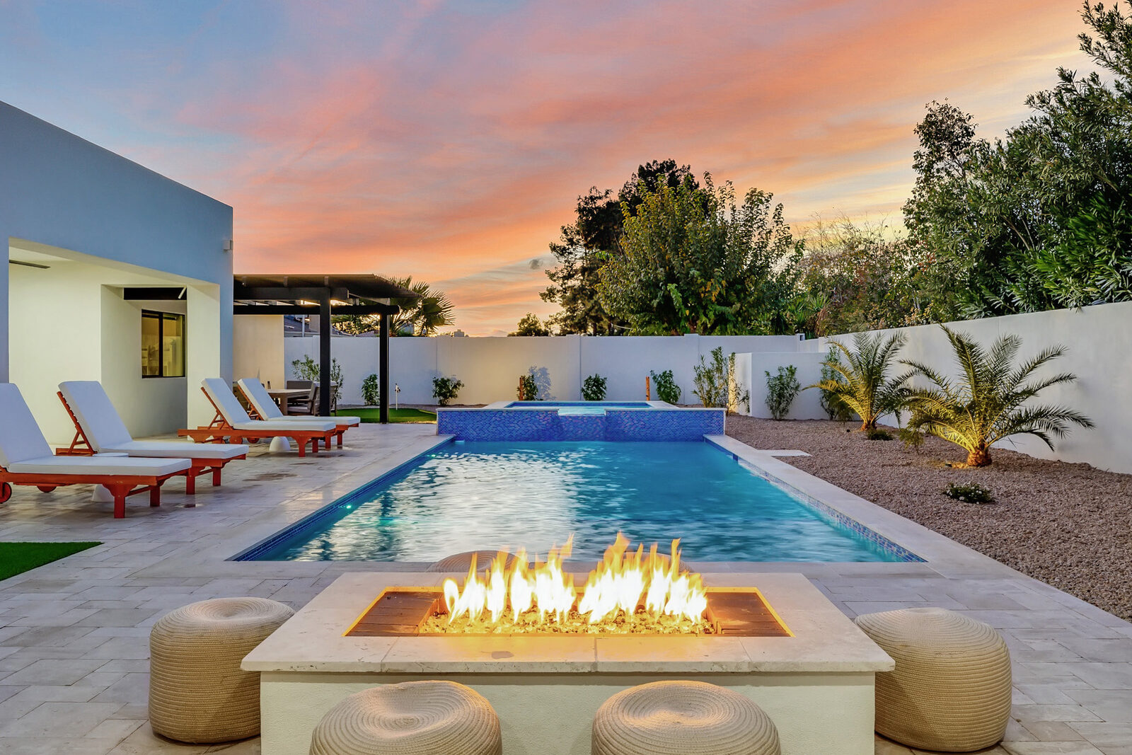 The pool, spa and putting green at Querencia, the largest home in the Camelback Stays collection, in late-afternoon Scottsdale light.