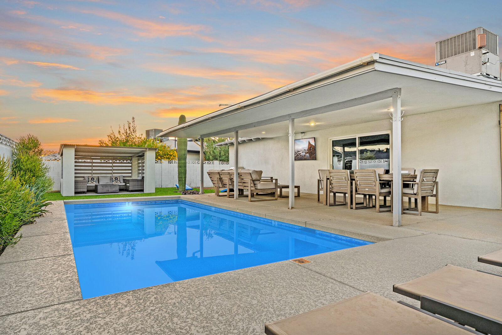 Poolside patio dining at Solace at twilight, Old Town Scottsdale