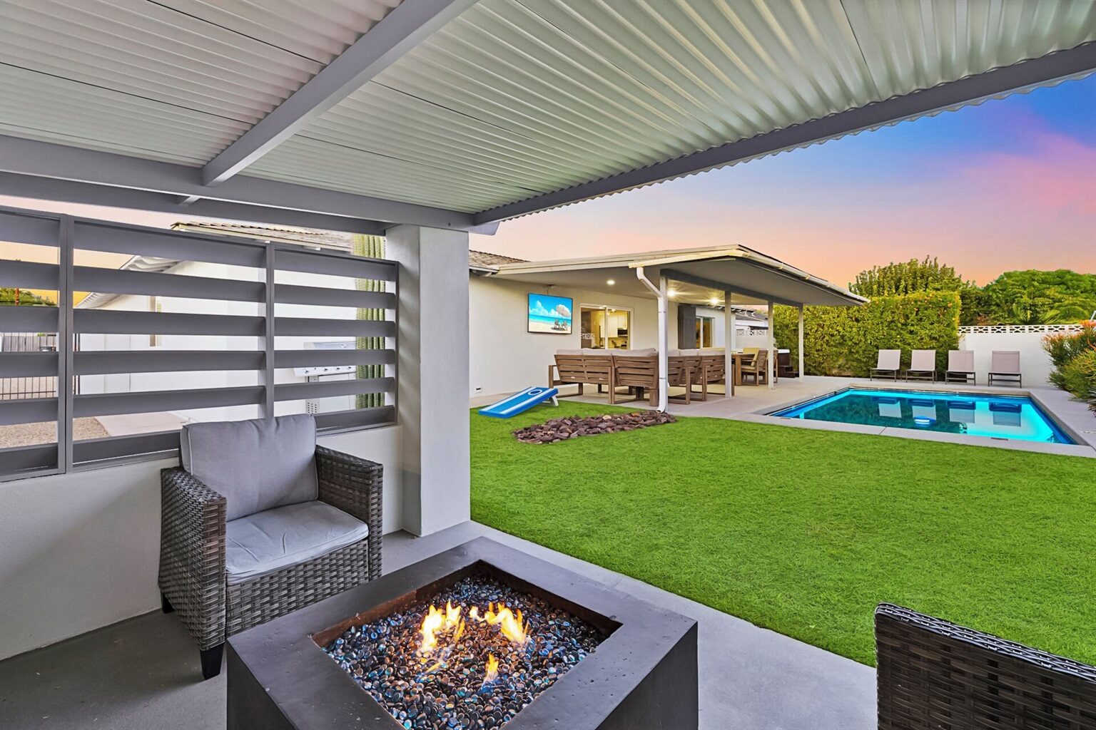 The firepit beside the pool at Solace at twilight, Old Town Scottsdale