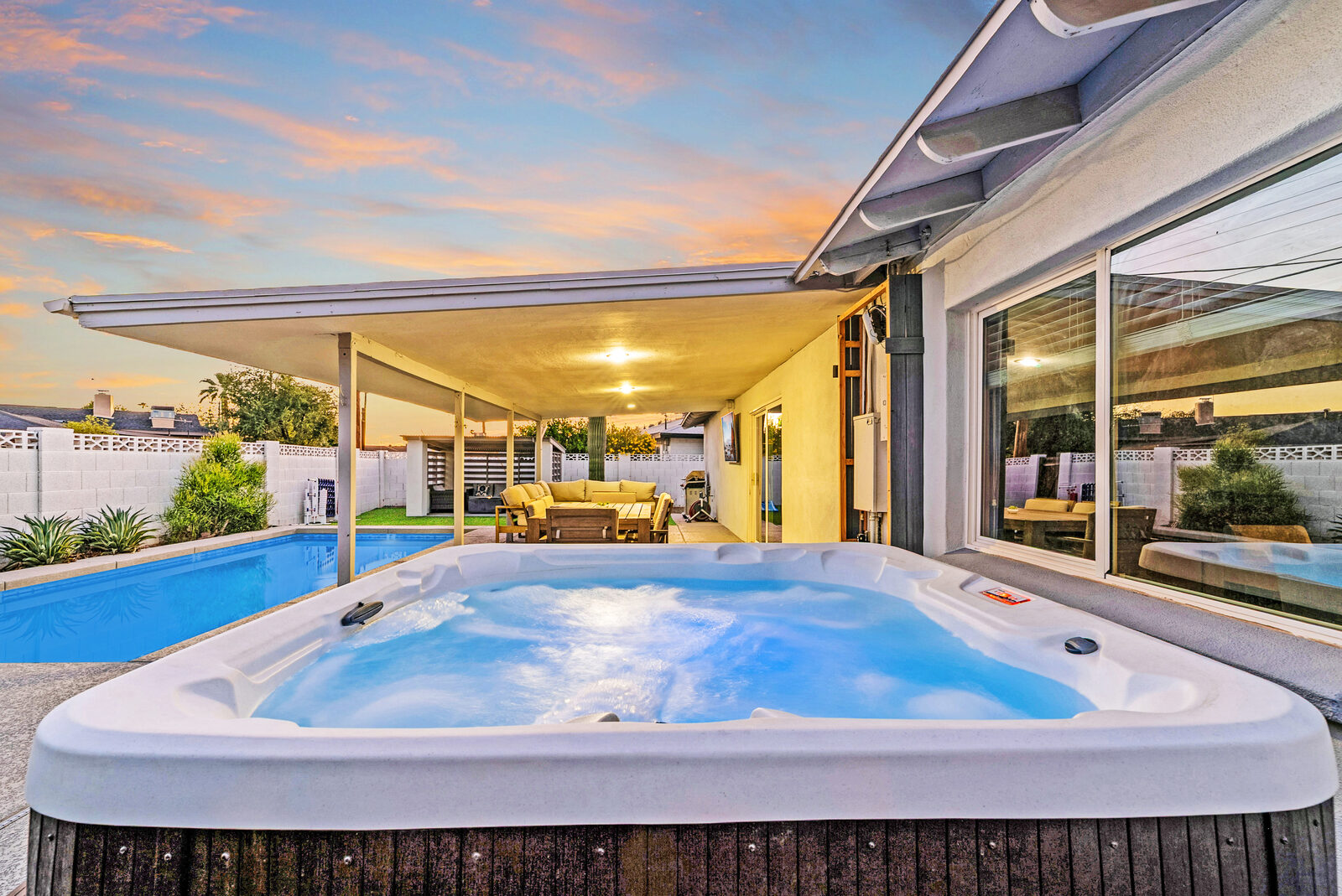 The pool and spa at Solace, a four-bedroom home in Old Town Scottsdale with the McDowell ridgeline on the skyline.
