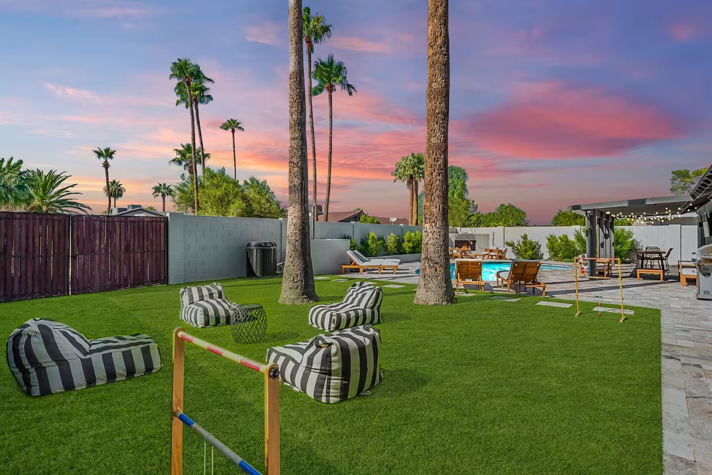 The turf lawn and pool at Vesper at twilight, Old Town Scottsdale